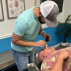 chiropractic-endonasal-therapy-surprise-az (2) 10 Reasons Why Hiring a Certified Chiropractor is So Important. Dr. Bain performs chiropractic endonasal correction on a surprise, az patient.